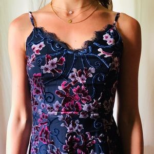 FRANCESCA’S velvet burnout mini dress.